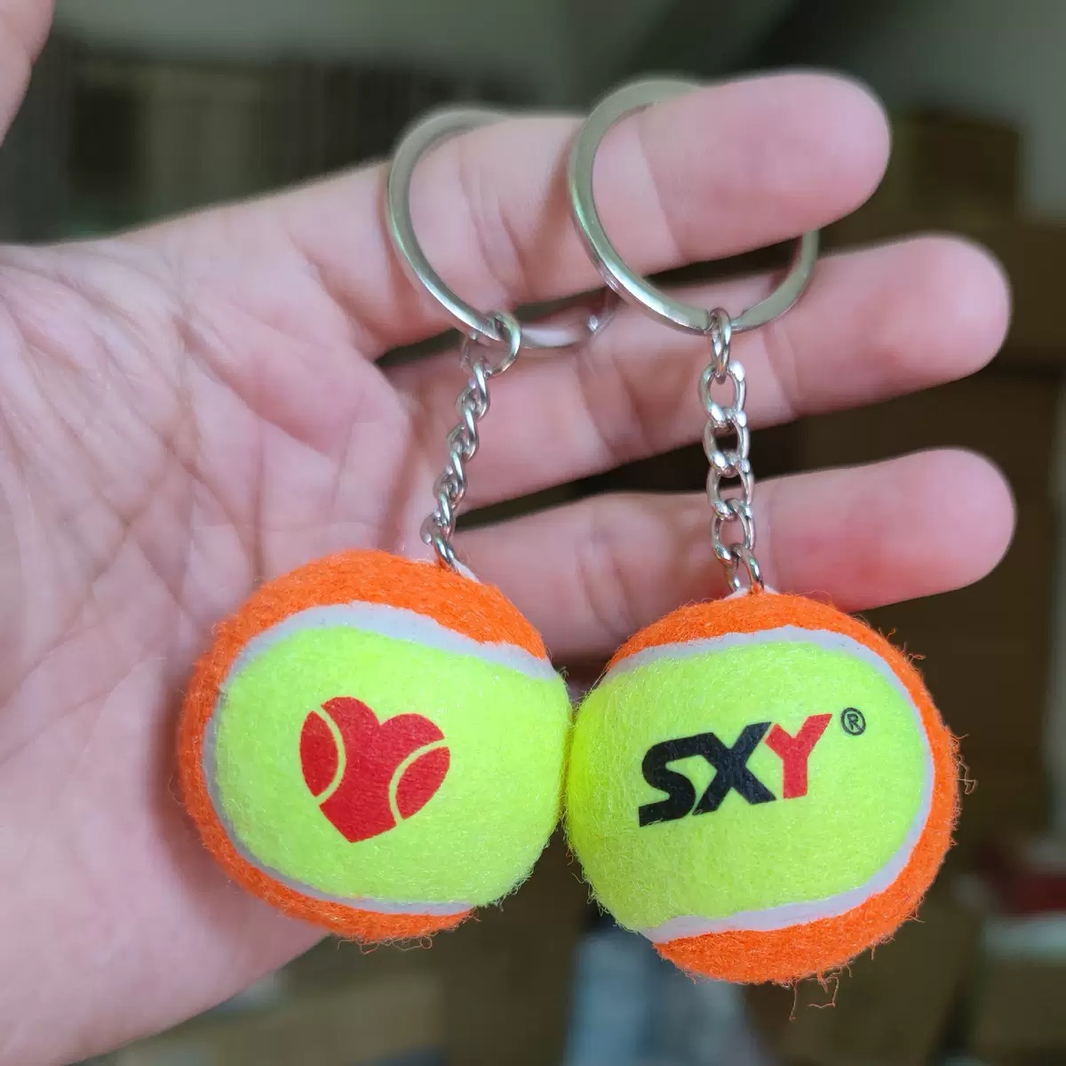 	Tennisball Schlüsselanhänger bedrucken lassen – Schlüsselanhänger Tennisball mit Logo als Werbeartikel 